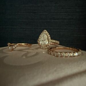 2.54 carat engagement ring with an elegant rose gold over a carat ring set.